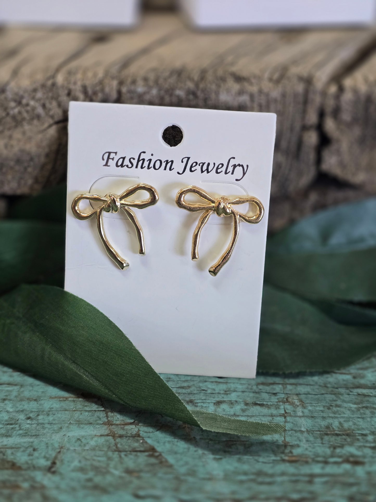 Gold tone Coquette Bow Stud Earrings