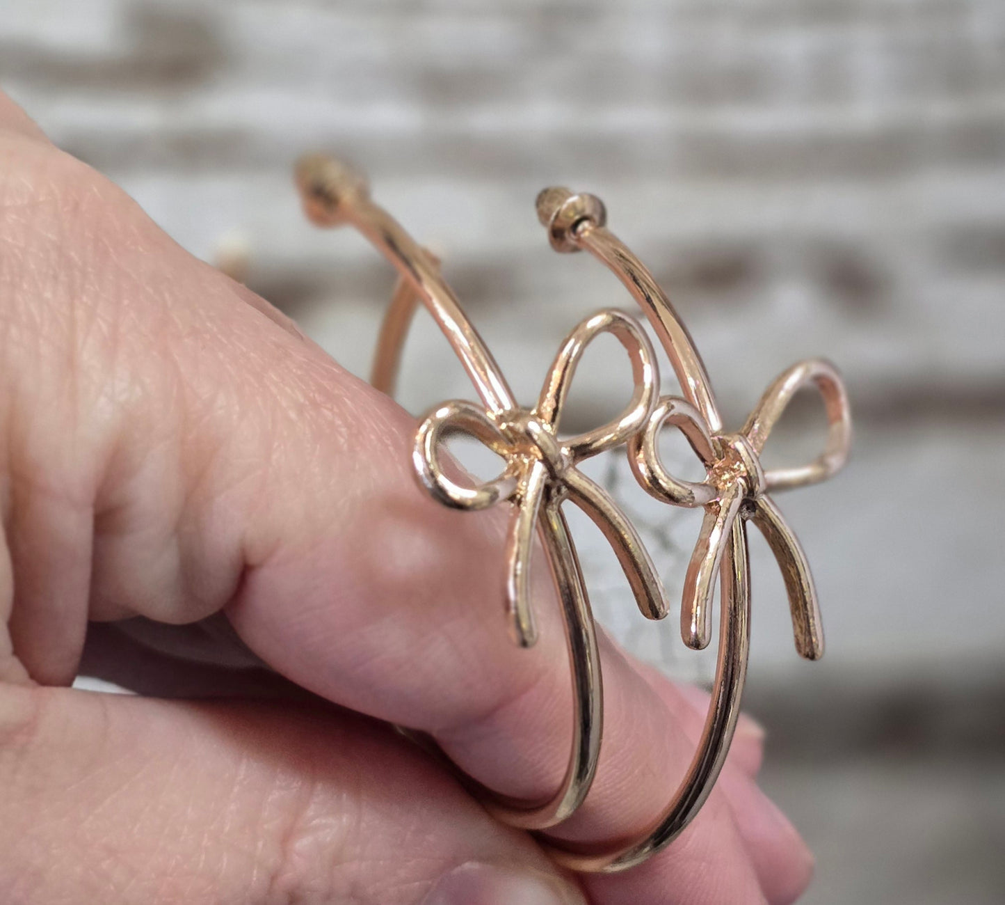 Gold tone Coquette Bow Hoop Earrings