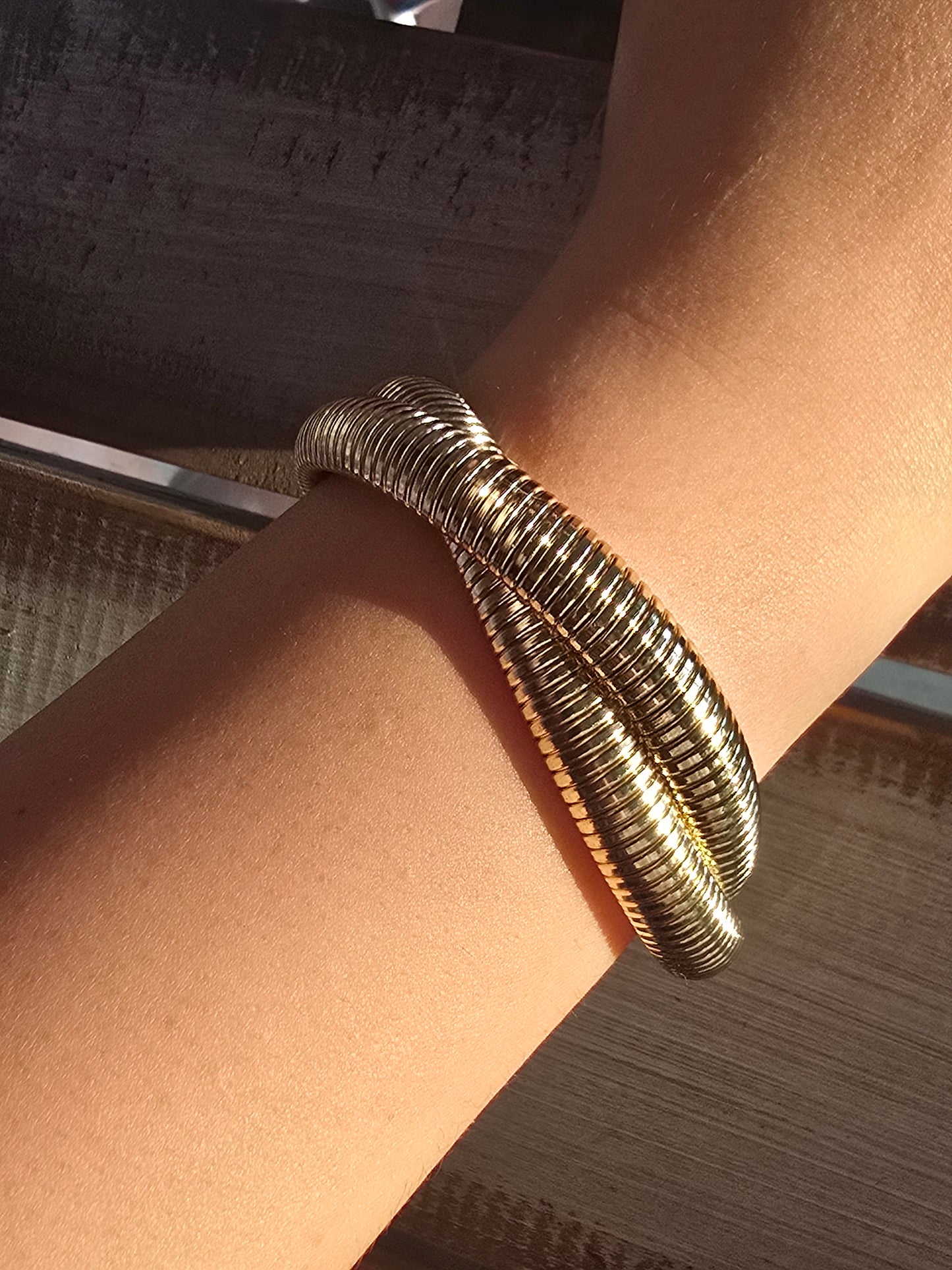 Double Twist Stretch Goldtone Bangles