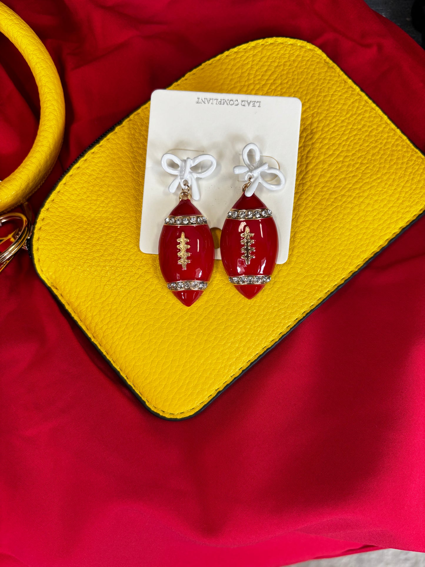 Bows and Football Dangle Earrings