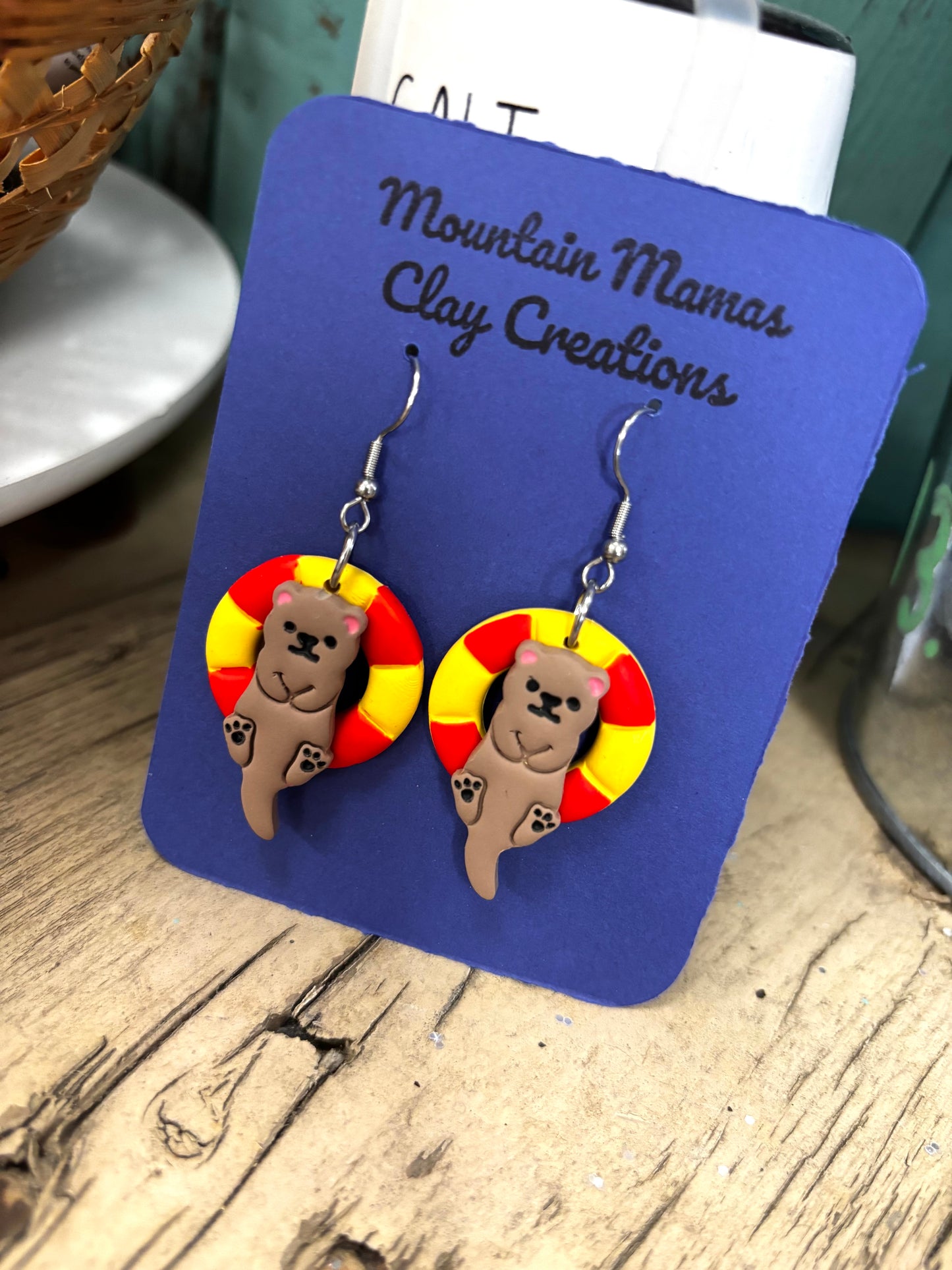 Floating Otters Dangle Clay Earrings