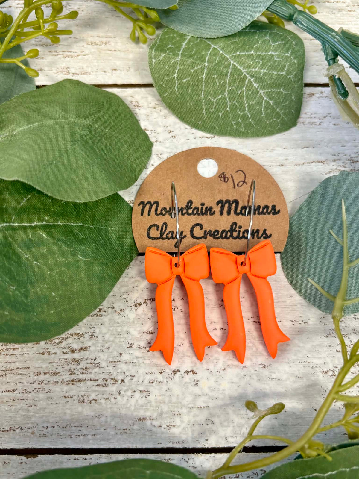 Clay Long Bow Hoop Earrings