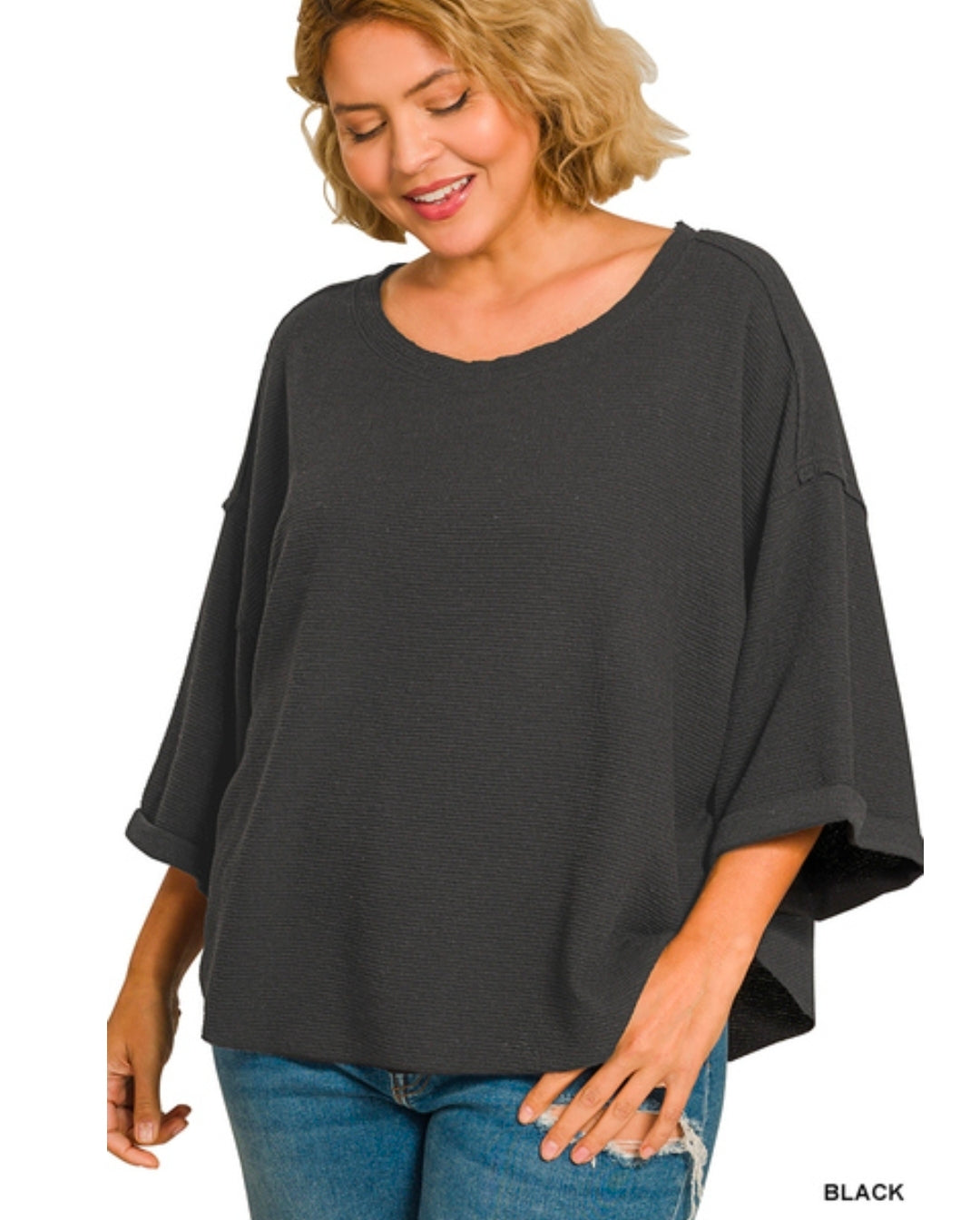 Double knit exposed seam curved hem short sleeve top